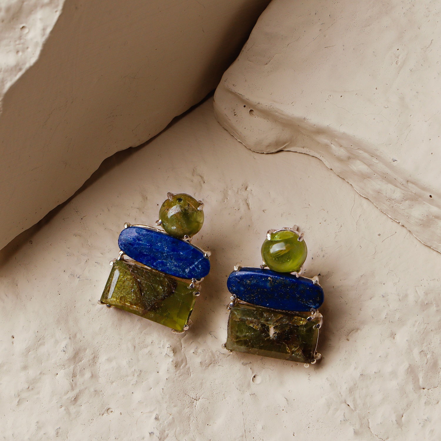 Bellflower: A handcrafted Earrings featuring Lapis Lazuli Peridot and hues of Blue Green.