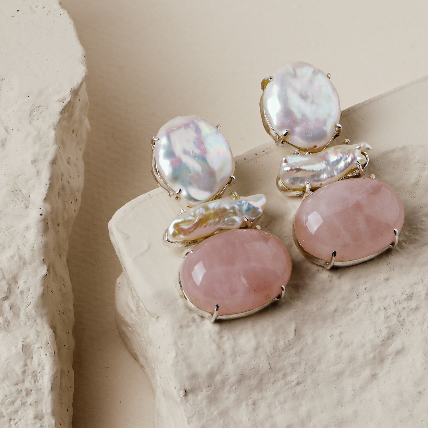 Clove Pink: A handcrafted Earrings featuring nan and hues of nan.