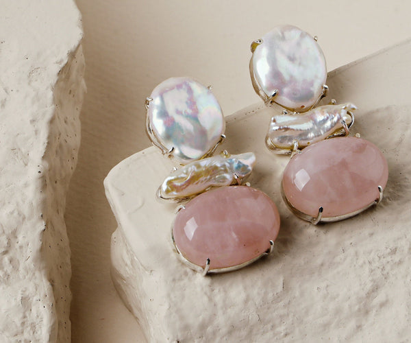 Clove Pink: A handcrafted Earrings featuring nan and hues of nan.