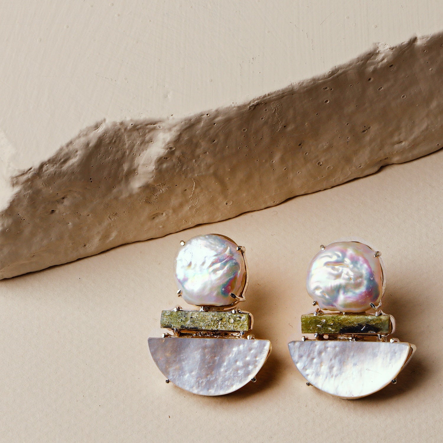 Arum: A handcrafted Earrings featuring nan and hues of nan.