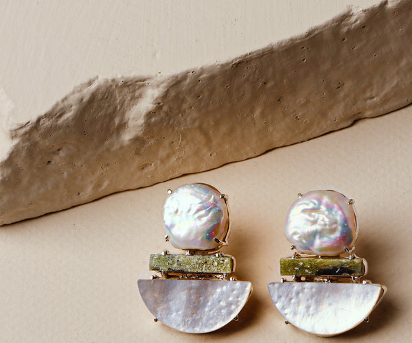 Arum: A handcrafted Earrings featuring nan and hues of nan.