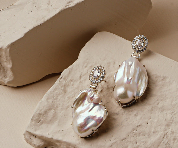 Daisy: A handcrafted Earrings featuring nan and hues of nan.