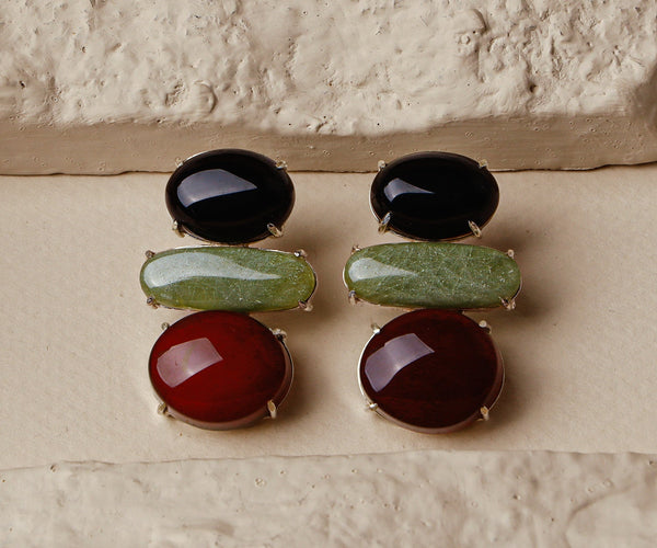 Dittany: A handcrafted Earrings featuring nan and hues of nan.