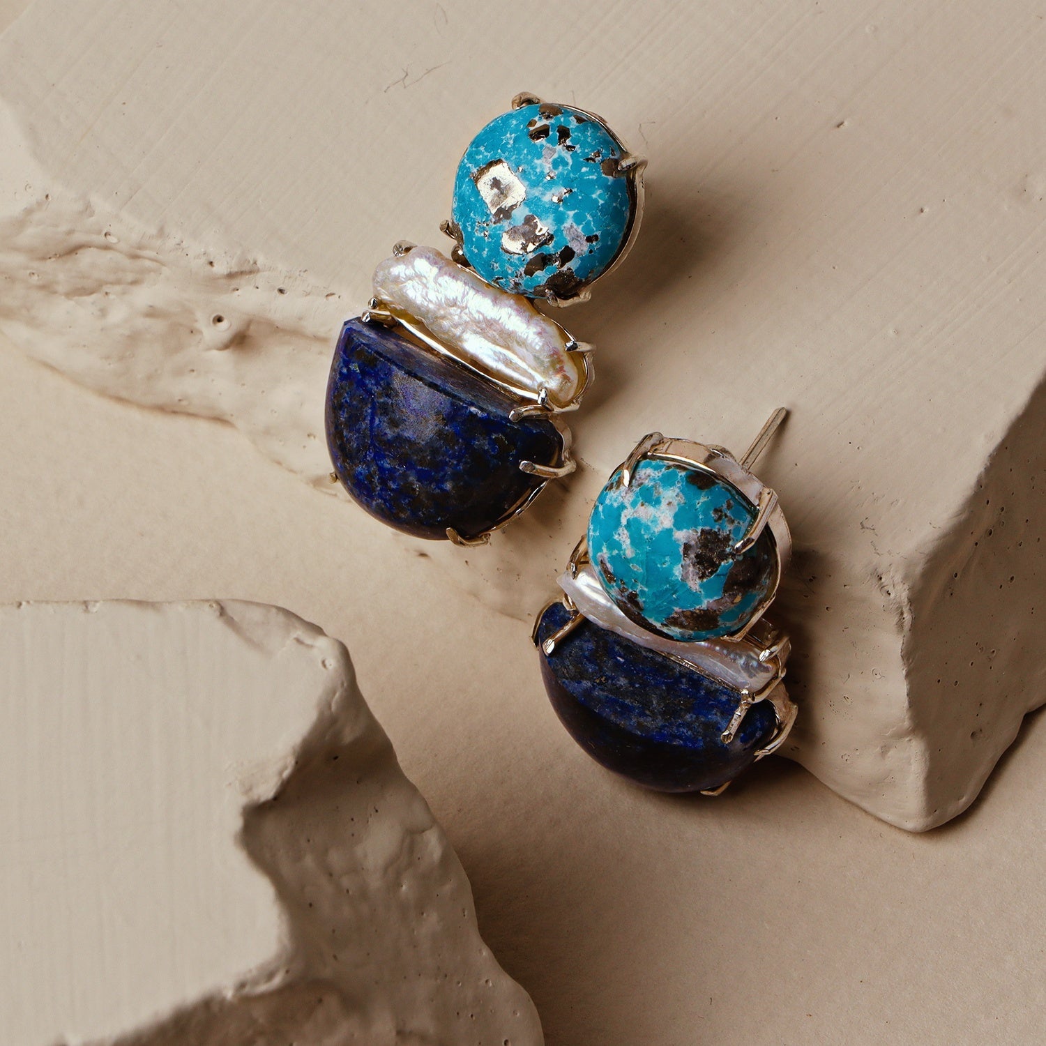 Iris: A handcrafted Earrings featuring nan and hues of nan.