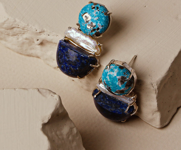 Iris: A handcrafted Earrings featuring nan and hues of nan.