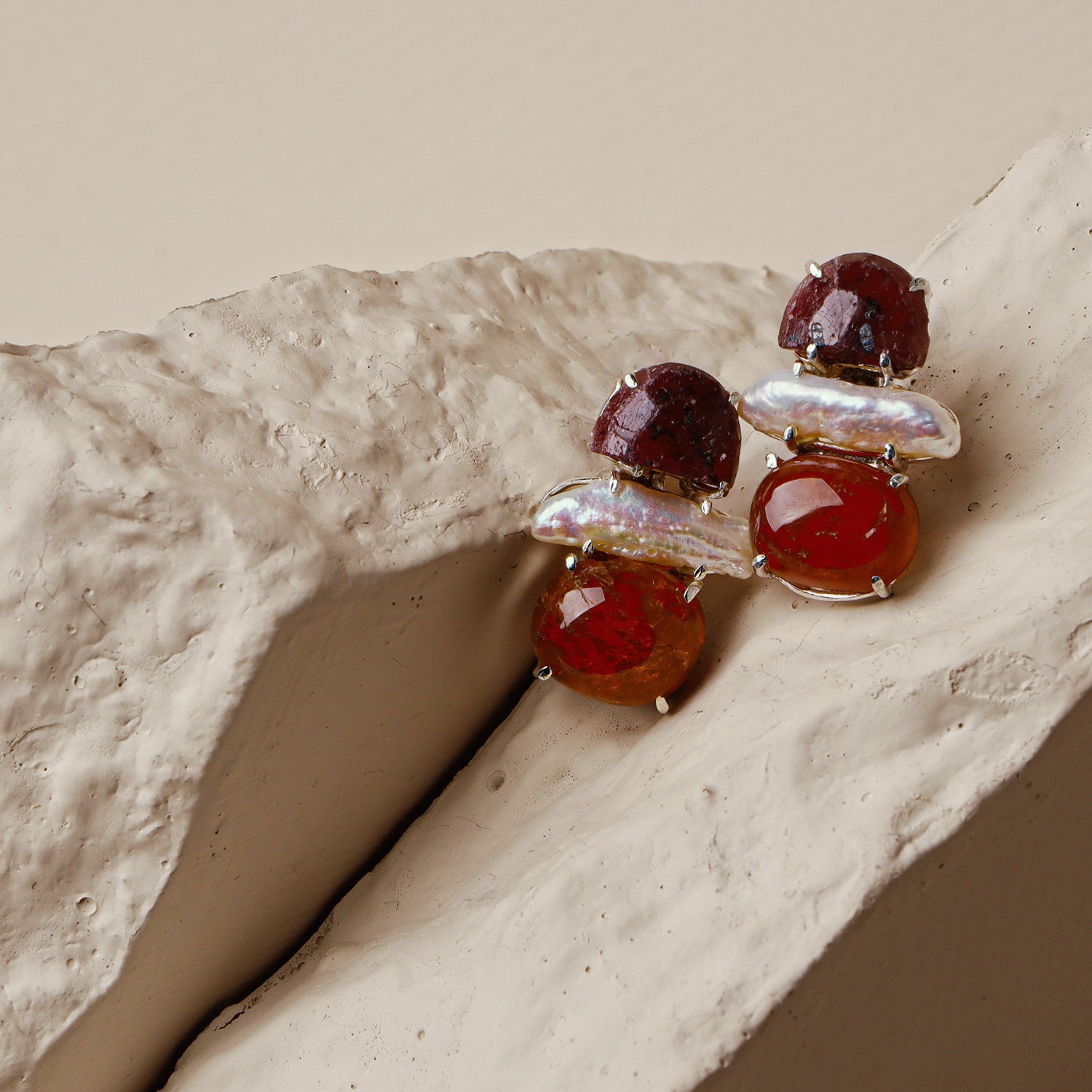 Pansy: A handcrafted Earrings featuring nan and hues of nan.