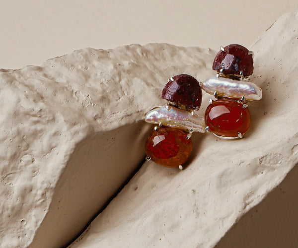Pansy: A handcrafted Earrings featuring nan and hues of nan.