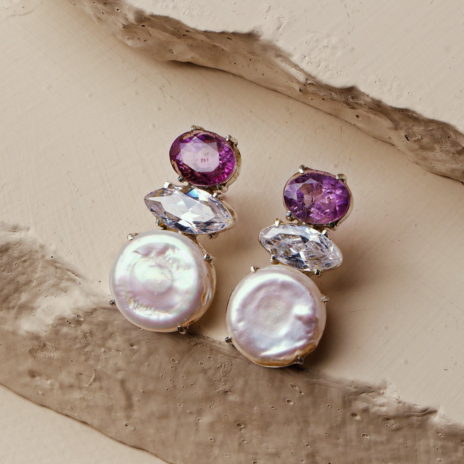 Lavender: A handcrafted Earrings featuring Amethyst Pearl  Zirconia and hues of Purple White.