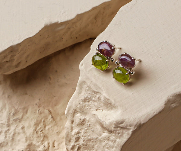 Lilac: A handcrafted Earrings featuring nan and hues of nan.