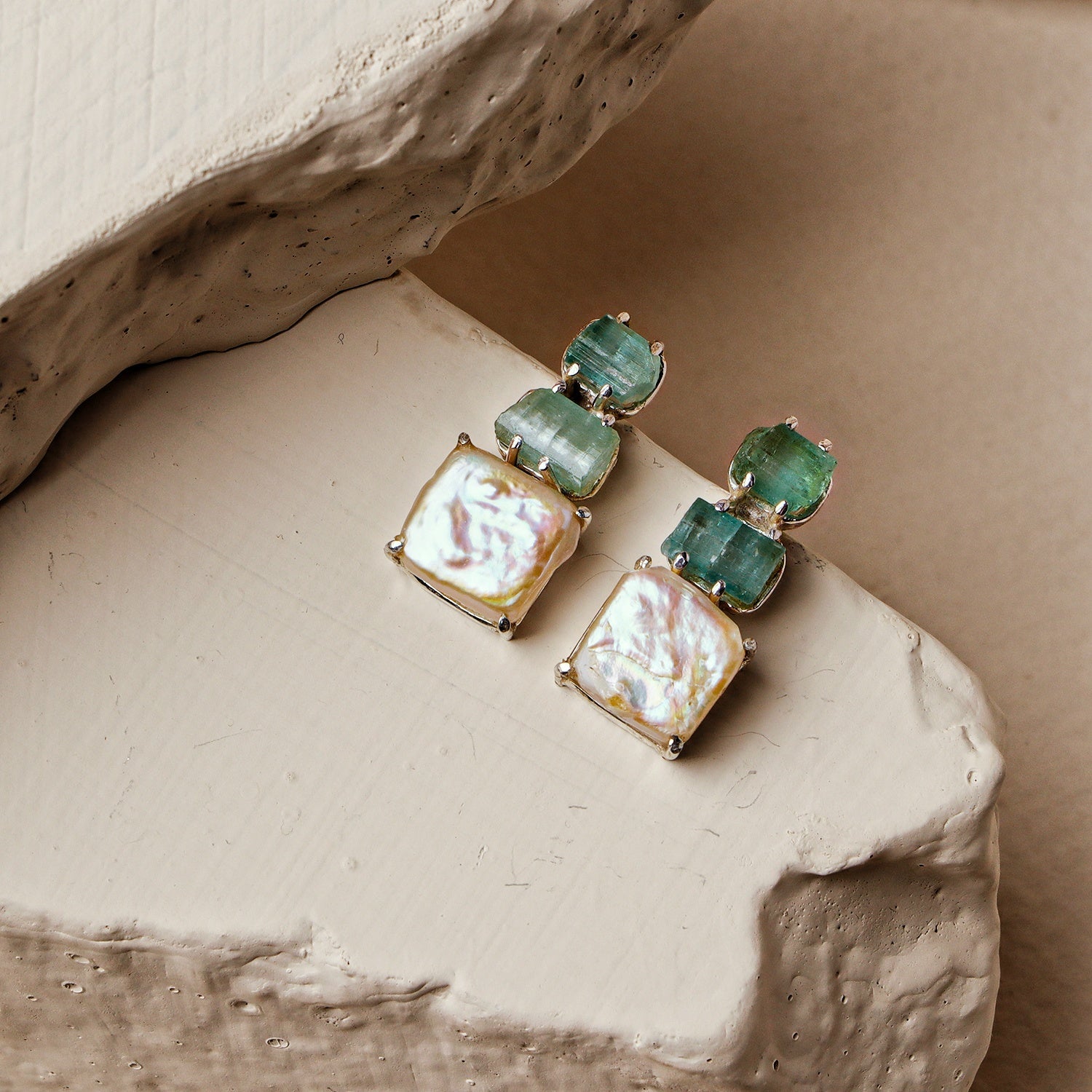 Peony: A handcrafted Earrings featuring nan and hues of nan.