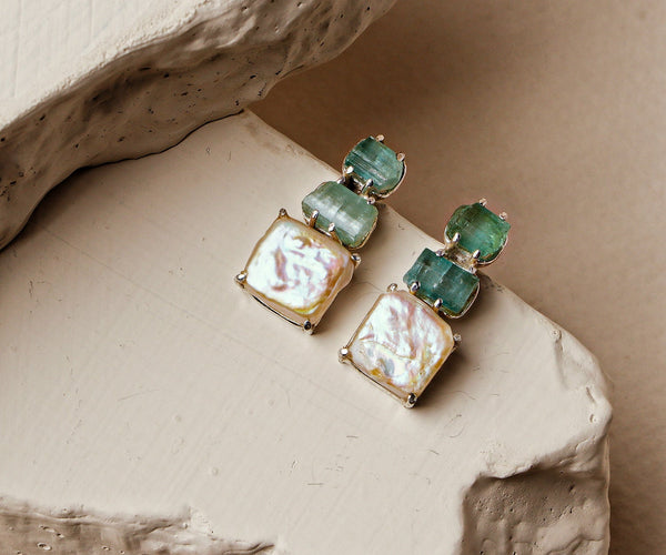 Peony: A handcrafted Earrings featuring nan and hues of nan.