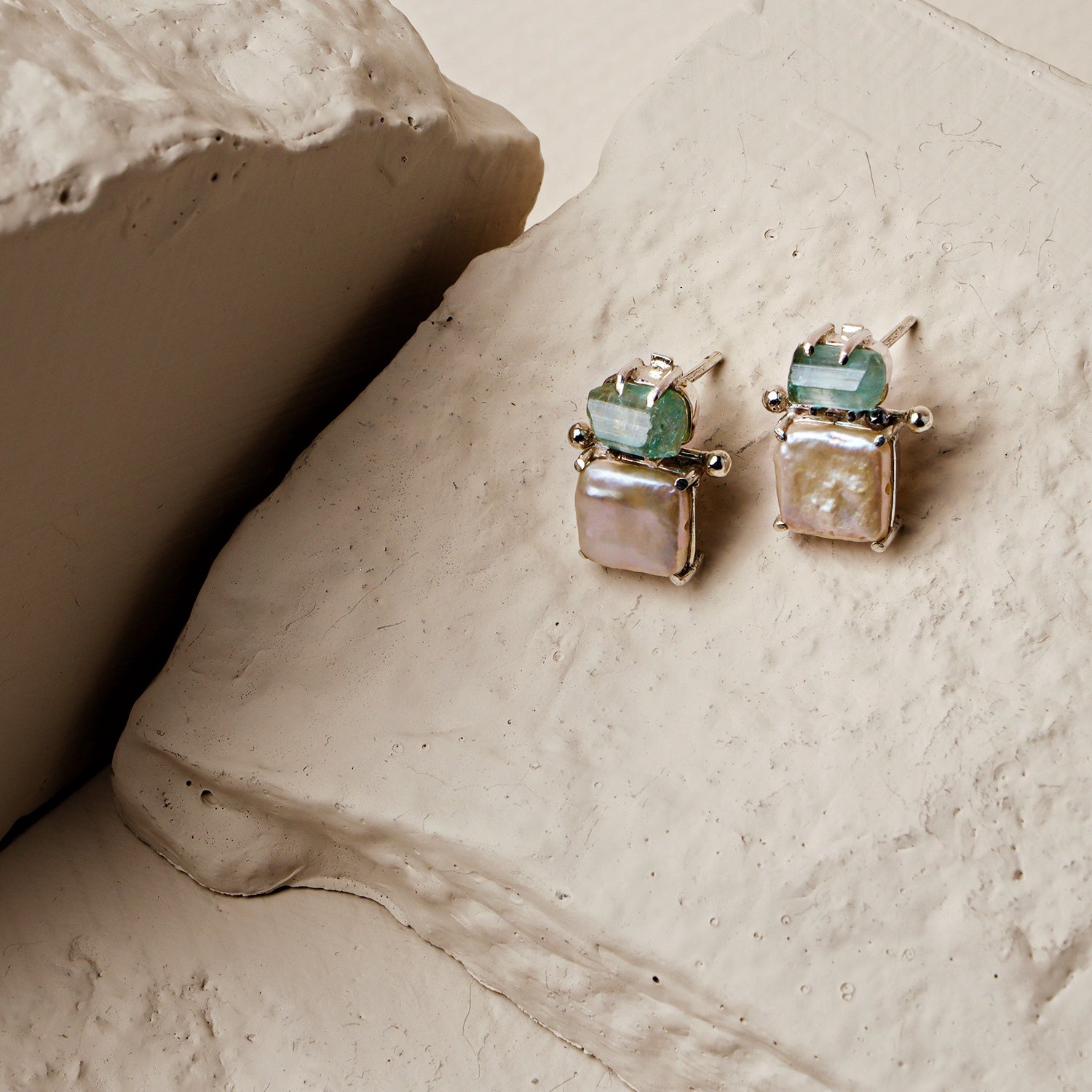 Periwinkle: A handcrafted Earrings featuring nan and hues of nan.