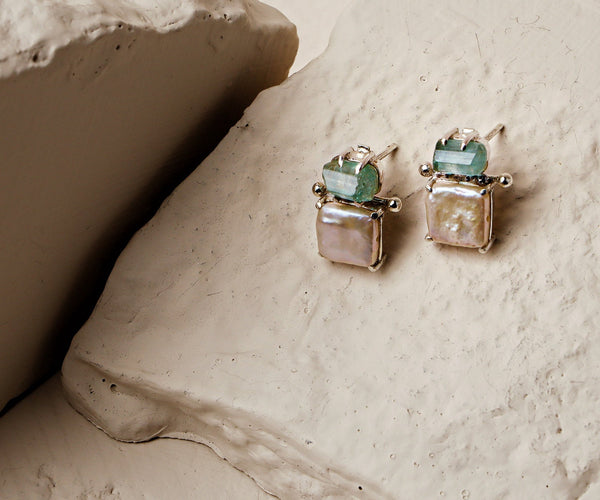 Periwinkle: A handcrafted Earrings featuring nan and hues of nan.