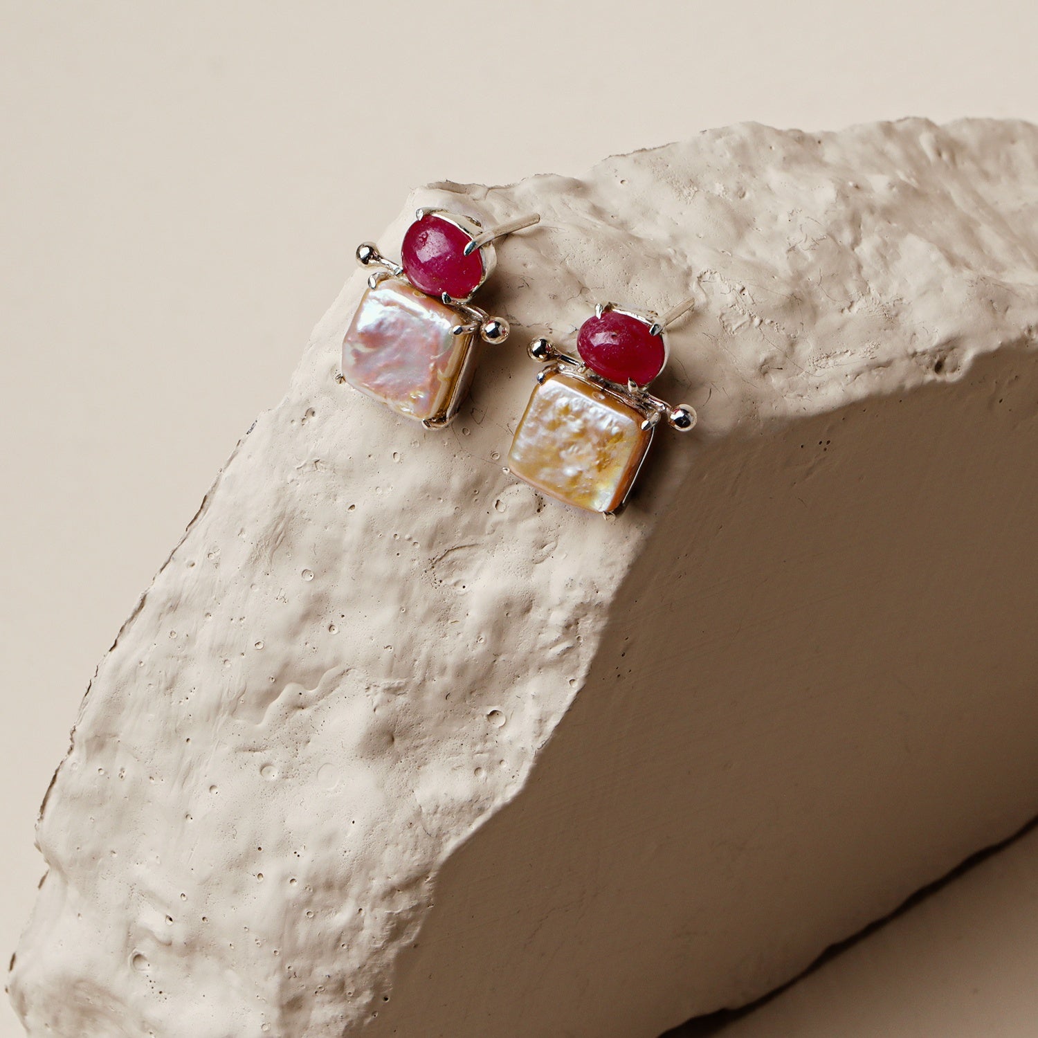 Pomegranate: A handcrafted Earrings featuring nan and hues of nan.