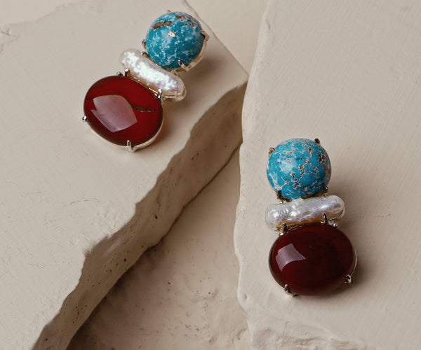 Sage: A handcrafted Earrings featuring nan and hues of nan.