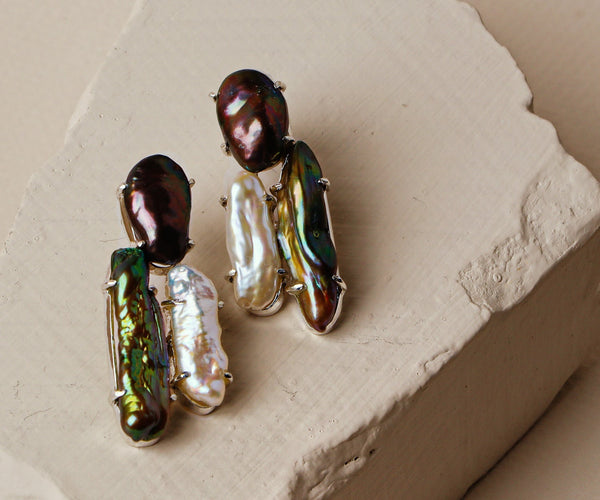 Water lily: A handcrafted Earrings featuring nan and hues of nan.