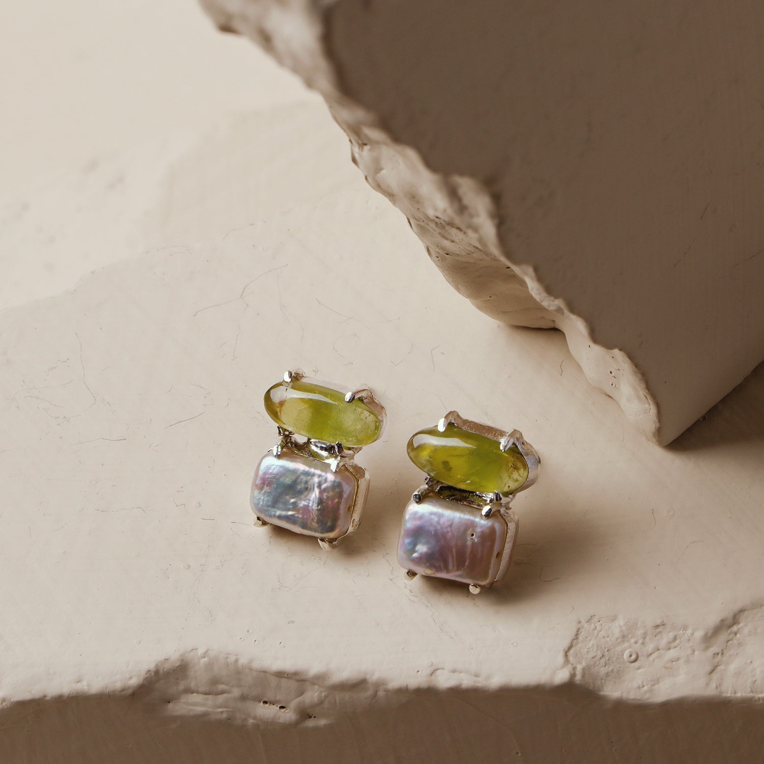 Bea Balm: A handcrafted Earrings featuring nan and hues of nan.