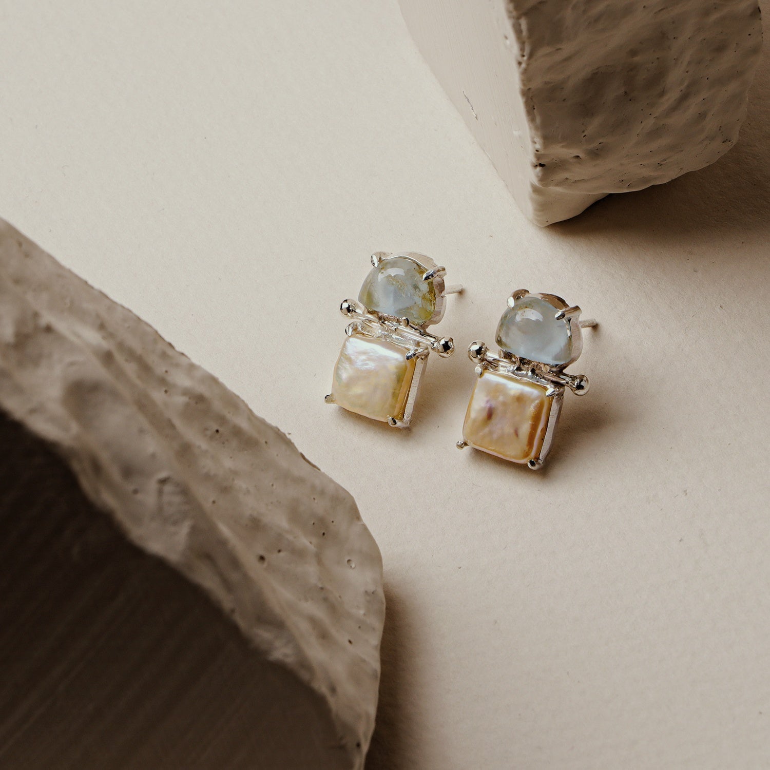 Calla: A handcrafted Earrings featuring nan and hues of nan.