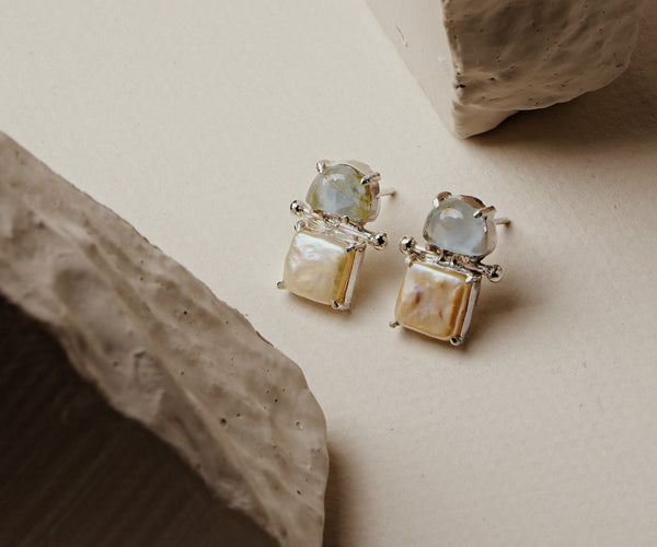 Calla: A handcrafted Earrings featuring nan and hues of nan.