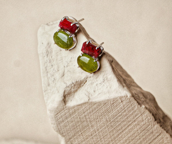 Clarkia: A handcrafted Earrings featuring nan and hues of nan.