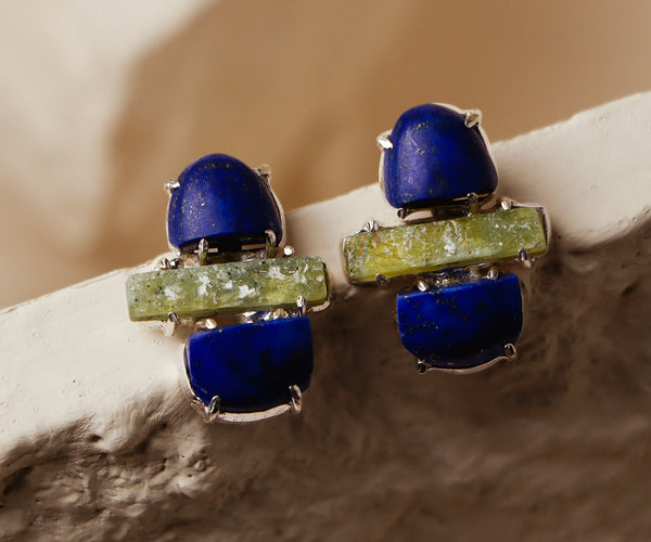 Clover: A handcrafted Earrings featuring nan and hues of nan.