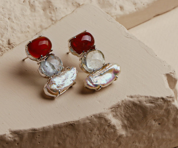 Coral Vine: A handcrafted Earrings featuring nan and hues of nan.