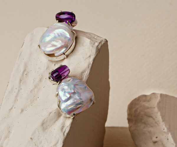 Daphne: A handcrafted Earrings featuring nan and hues of nan.