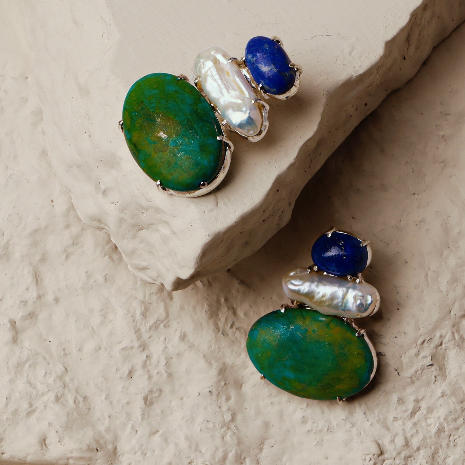 Deutzia: A handcrafted Earrings featuring nan and hues of nan.