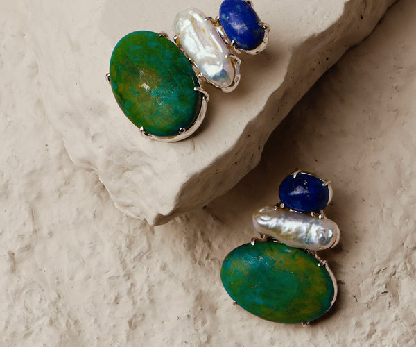 Deutzia: A handcrafted Earrings featuring nan and hues of nan.