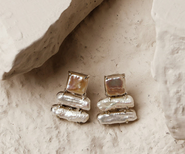 Erica: A handcrafted Earrings featuring nan and hues of nan.