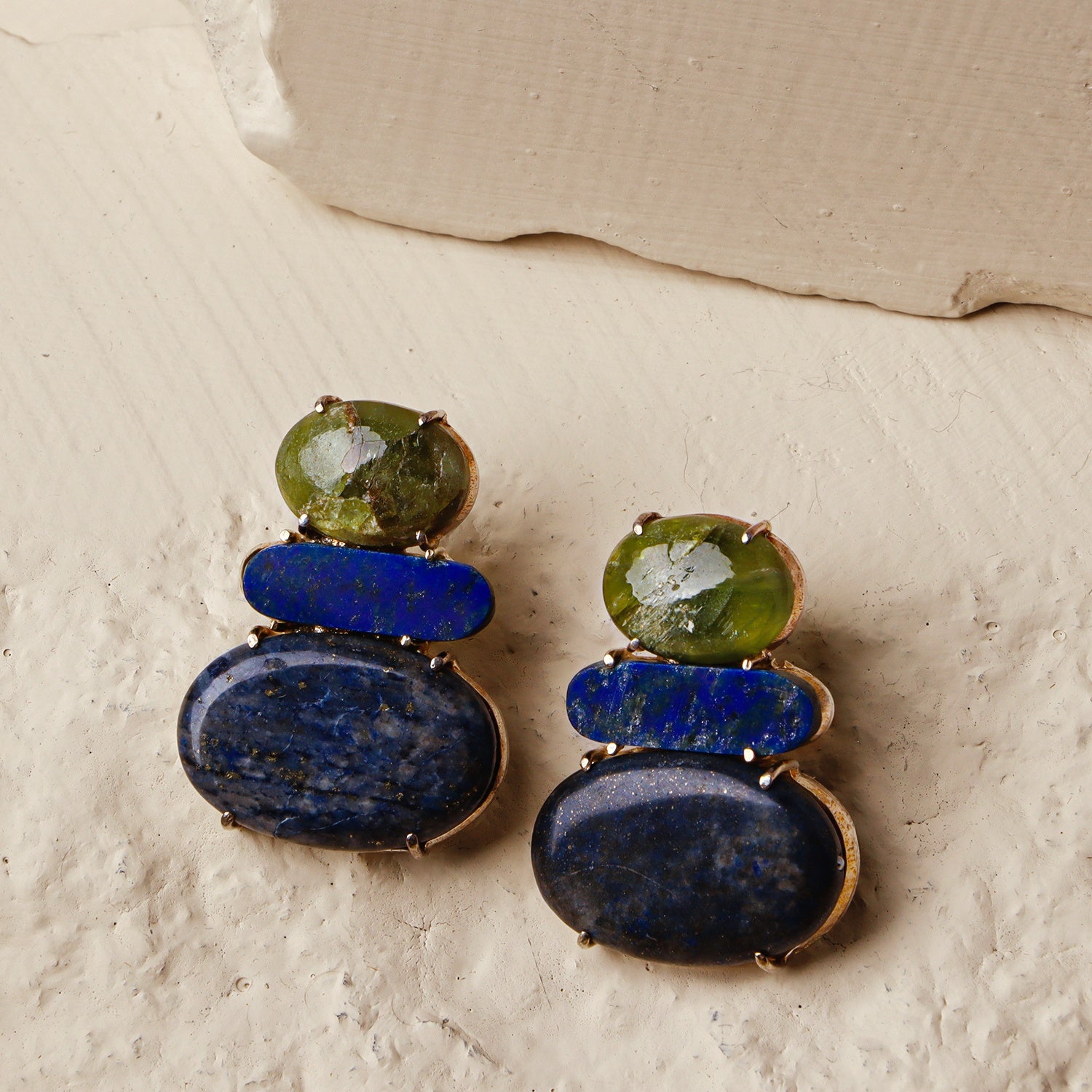 Olive & Jupiter: A handcrafted Earrings featuring nan and hues of nan.