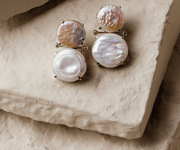 Moon: A handcrafted Earrings featuring nan and hues of nan.
