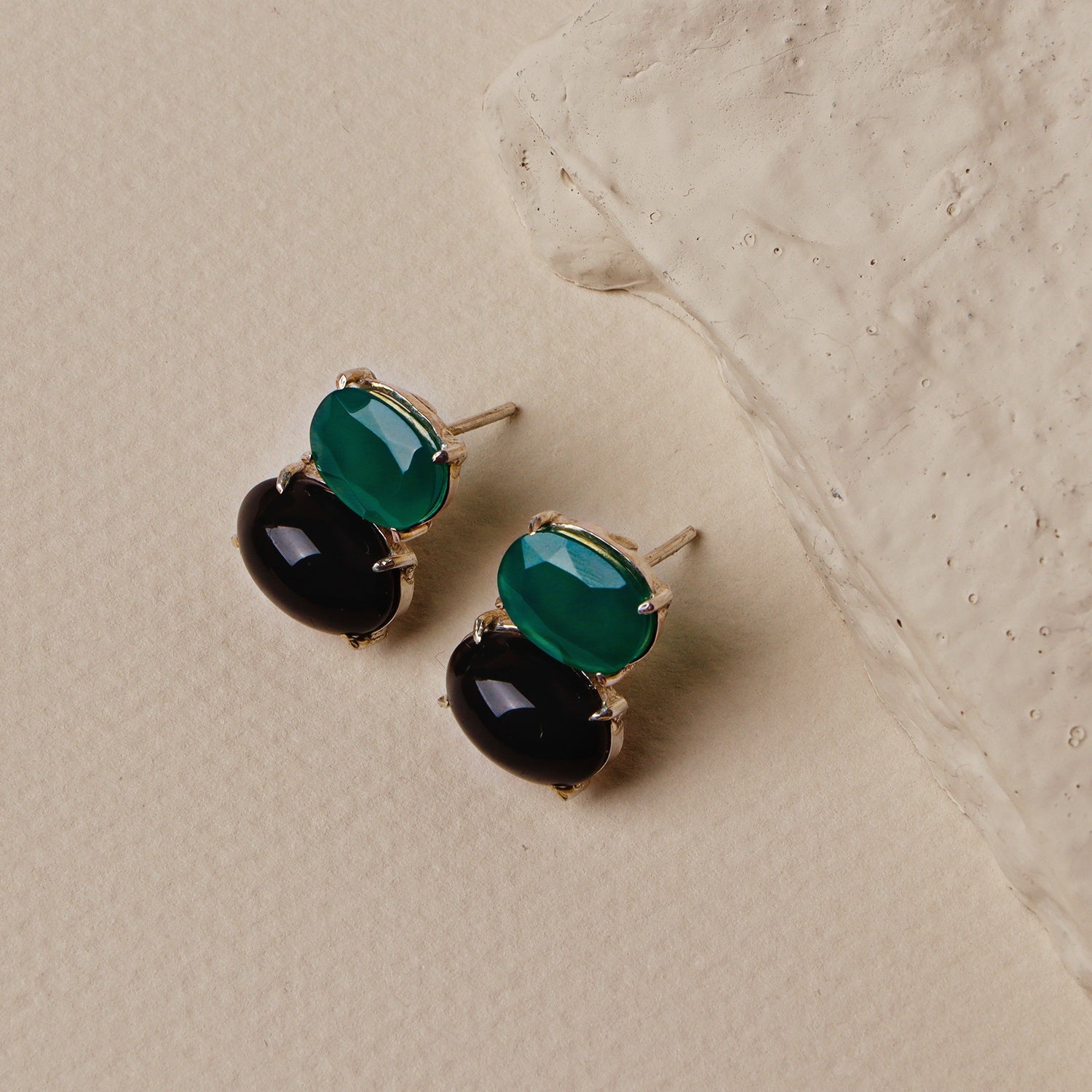 Beatles: A handcrafted Earrings featuring Onyx and hues of Black Green.