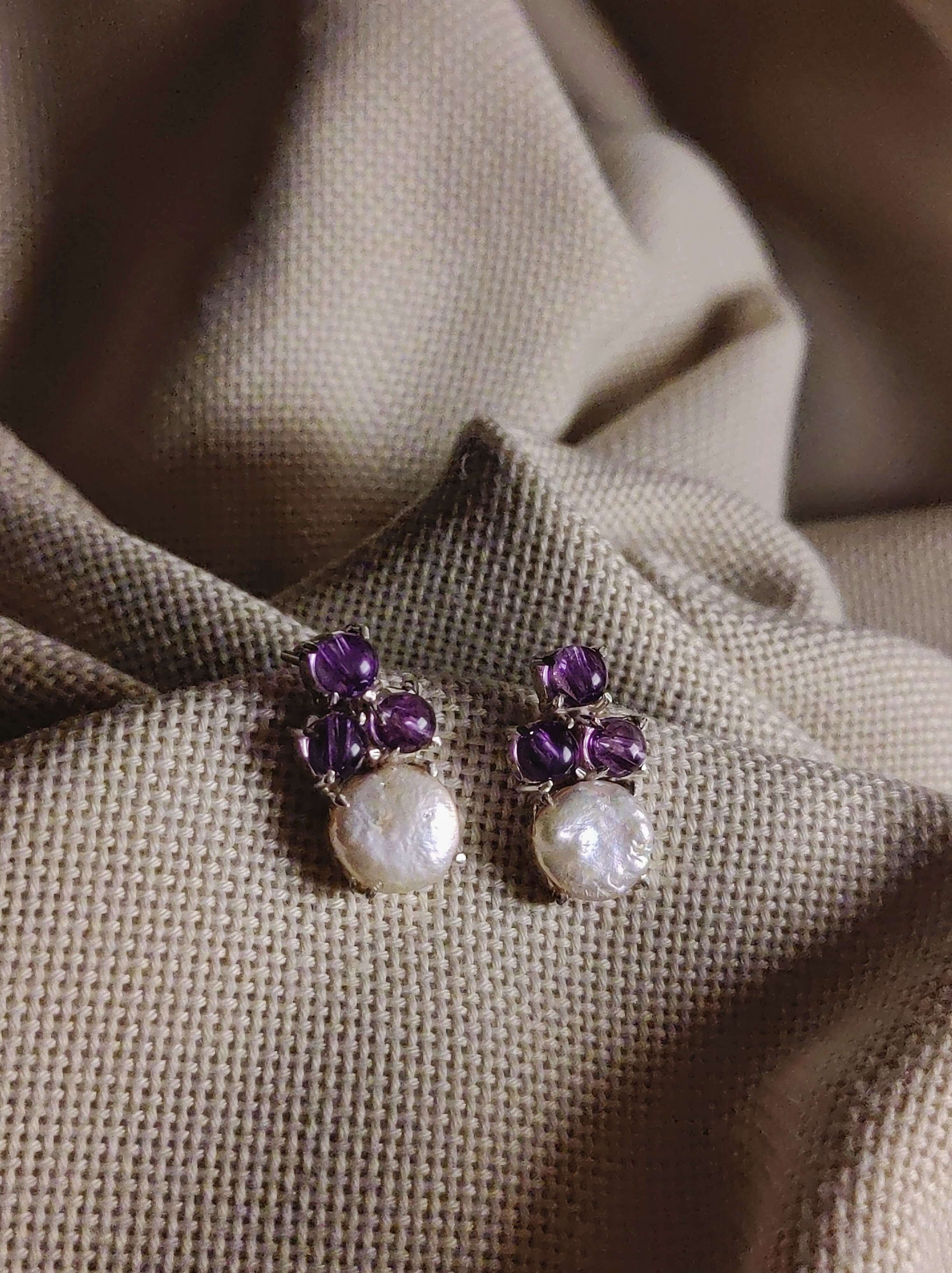Monsoon lily: A handcrafted Earrings featuring nan and hues of nan.