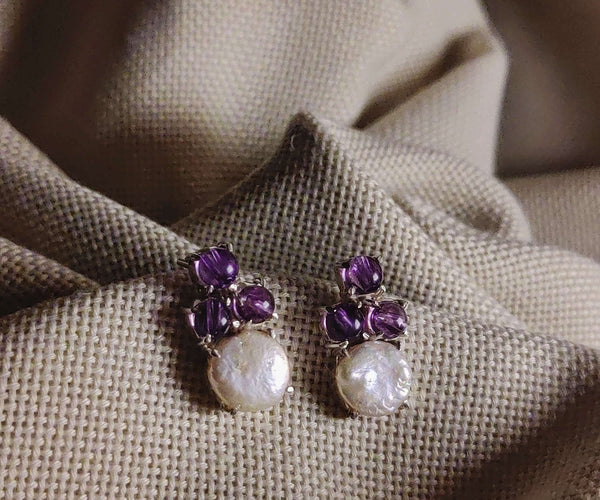 Monsoon lily: A handcrafted Earrings featuring nan and hues of nan.