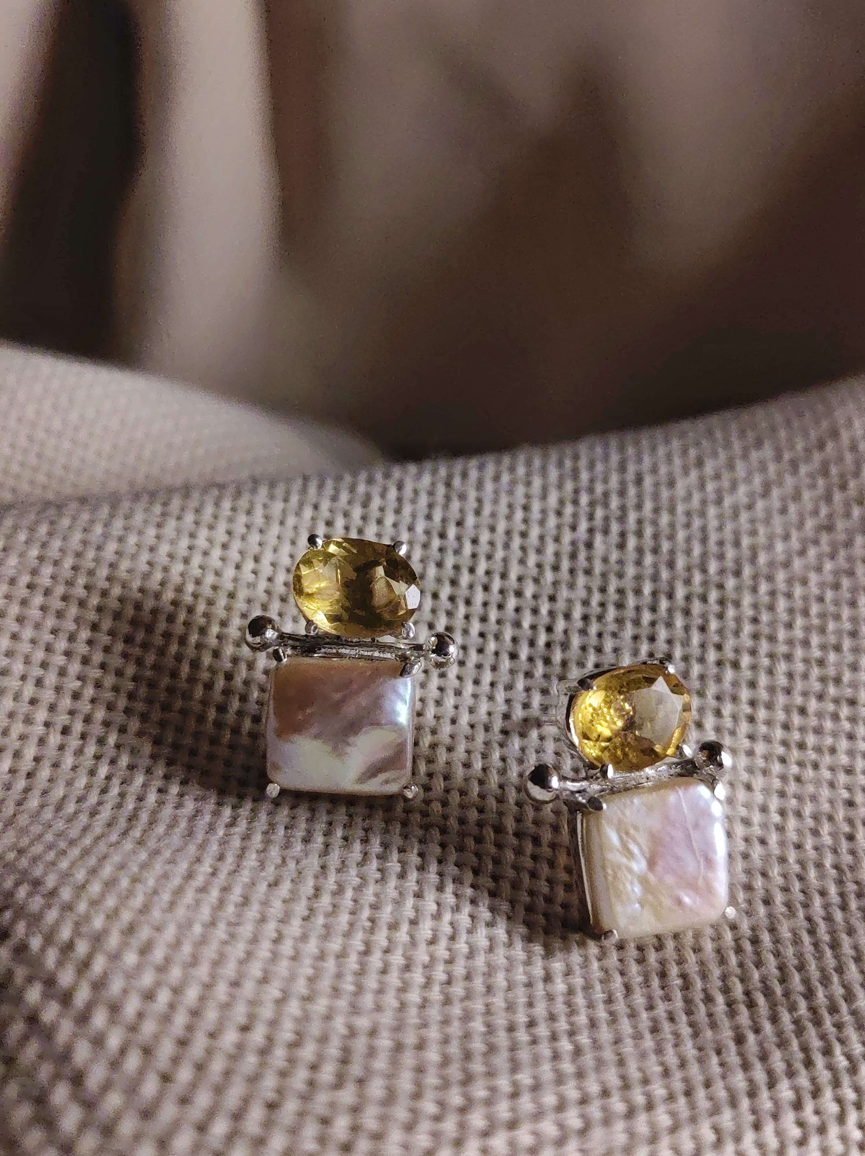 Narcissus: A handcrafted Earrings featuring nan and hues of nan.