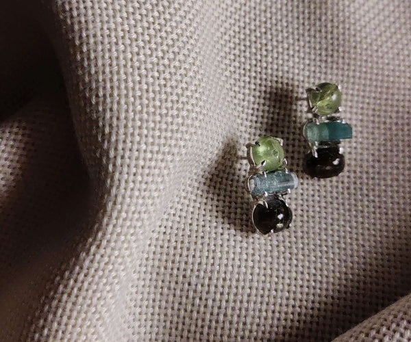 Flax: A handcrafted Earrings featuring Peridot Tourmaline Sapphire and hues of Green.