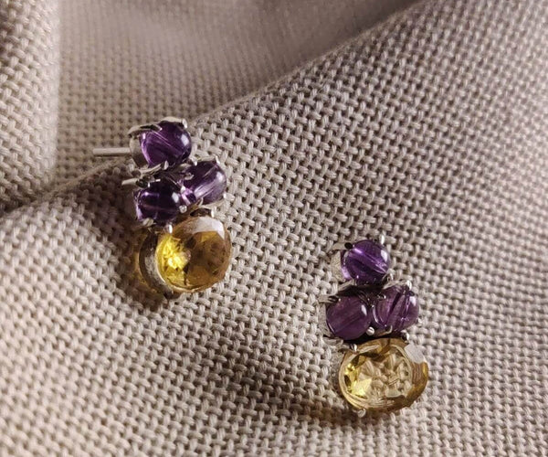 Tansy: A handcrafted Earrings featuring nan and hues of nan.