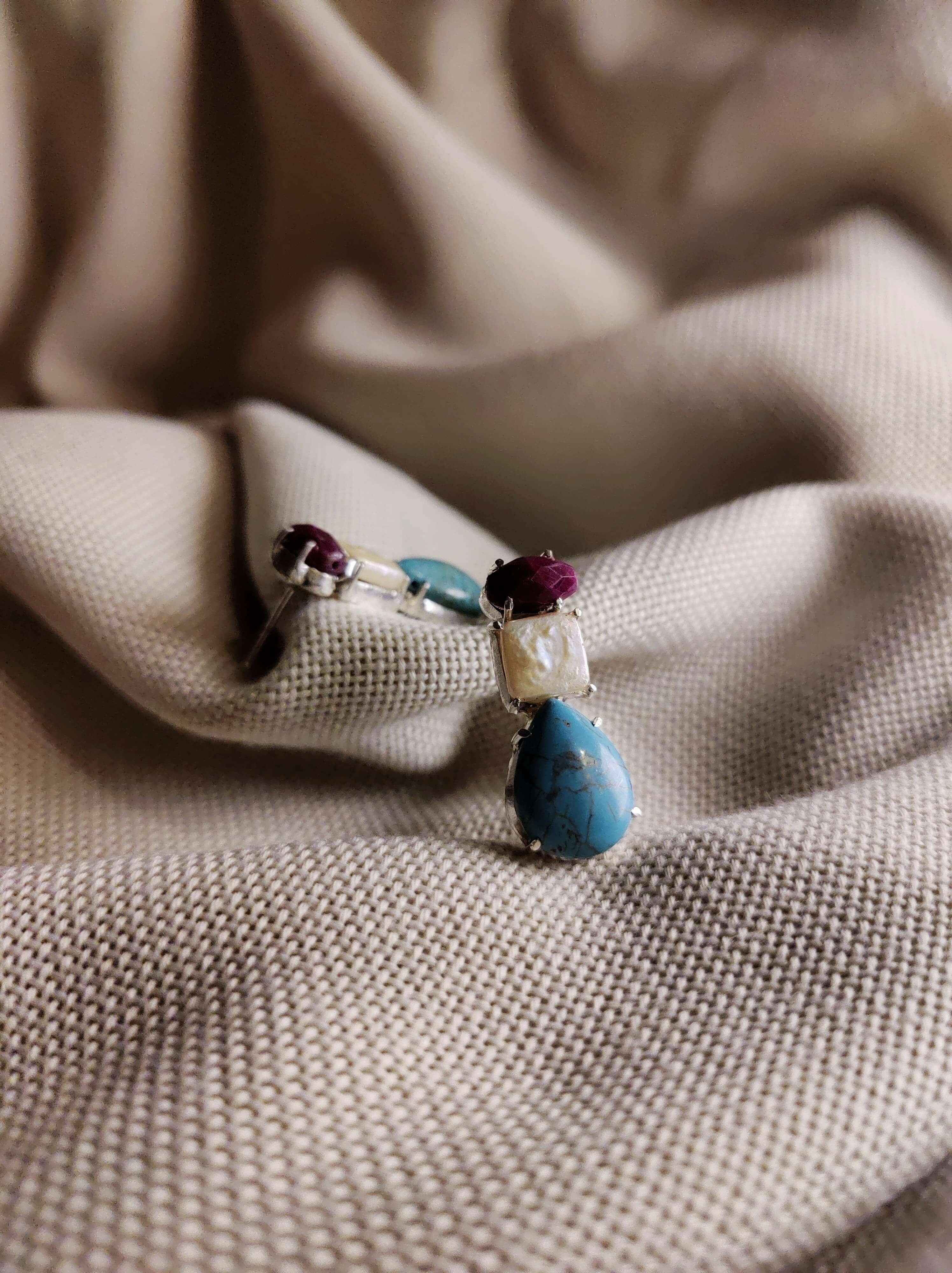 Rosemallows: A handcrafted Earrings featuring nan and hues of nan.