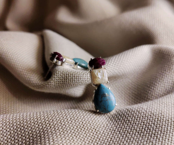 Rosemallows: A handcrafted Earrings featuring nan and hues of nan.