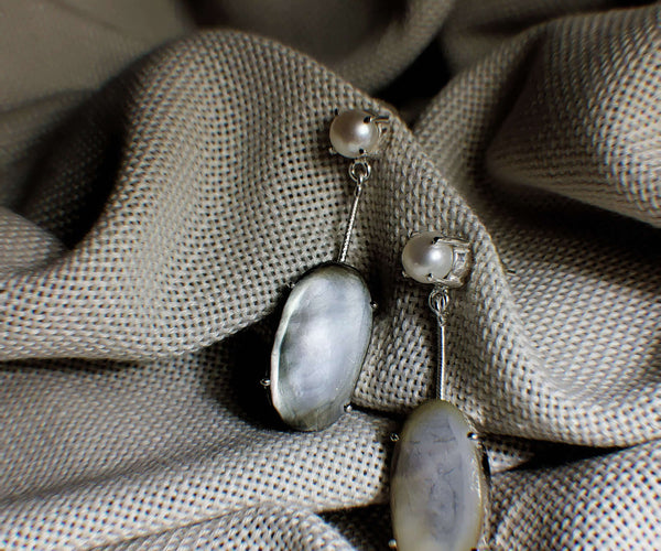 Anemone: A handcrafted Earrings featuring nan and hues of nan.