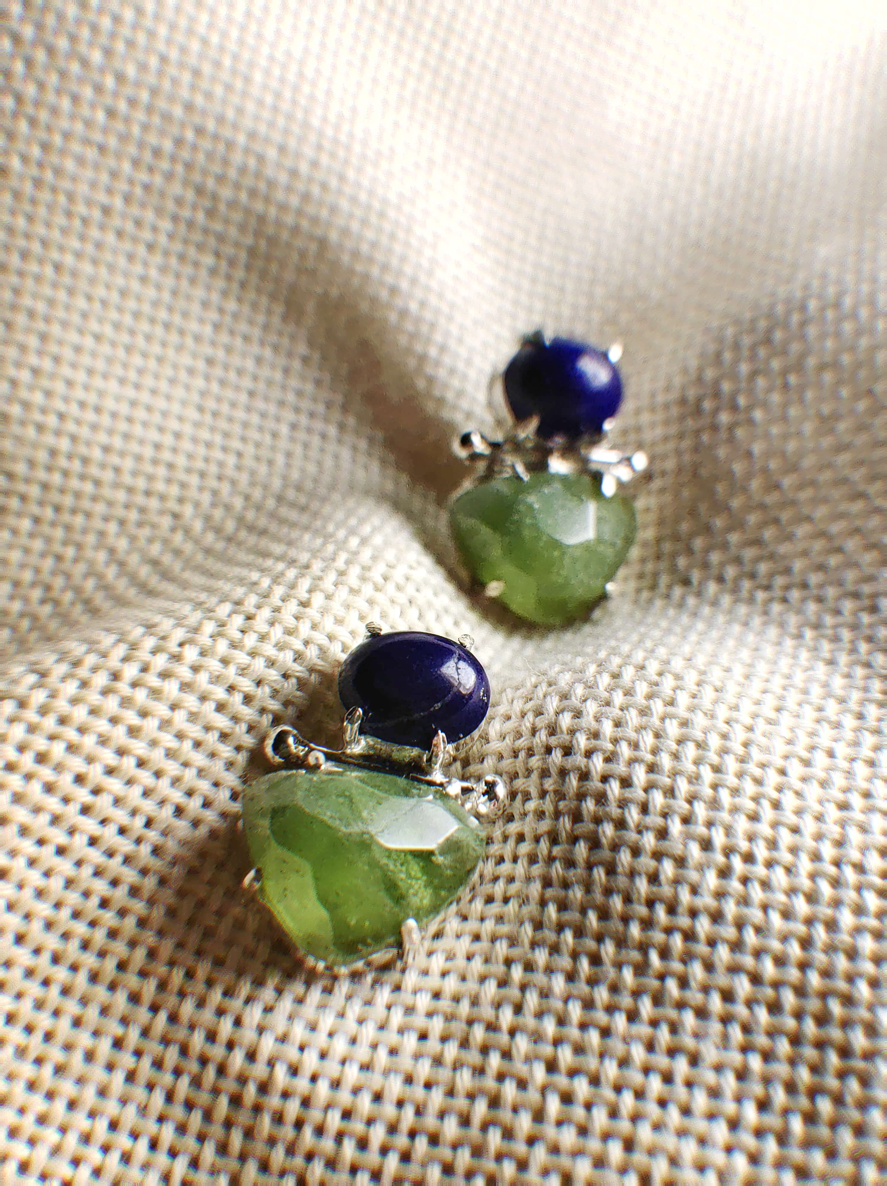 Bird-bill flower: A handcrafted Earrings featuring nan and hues of nan.
