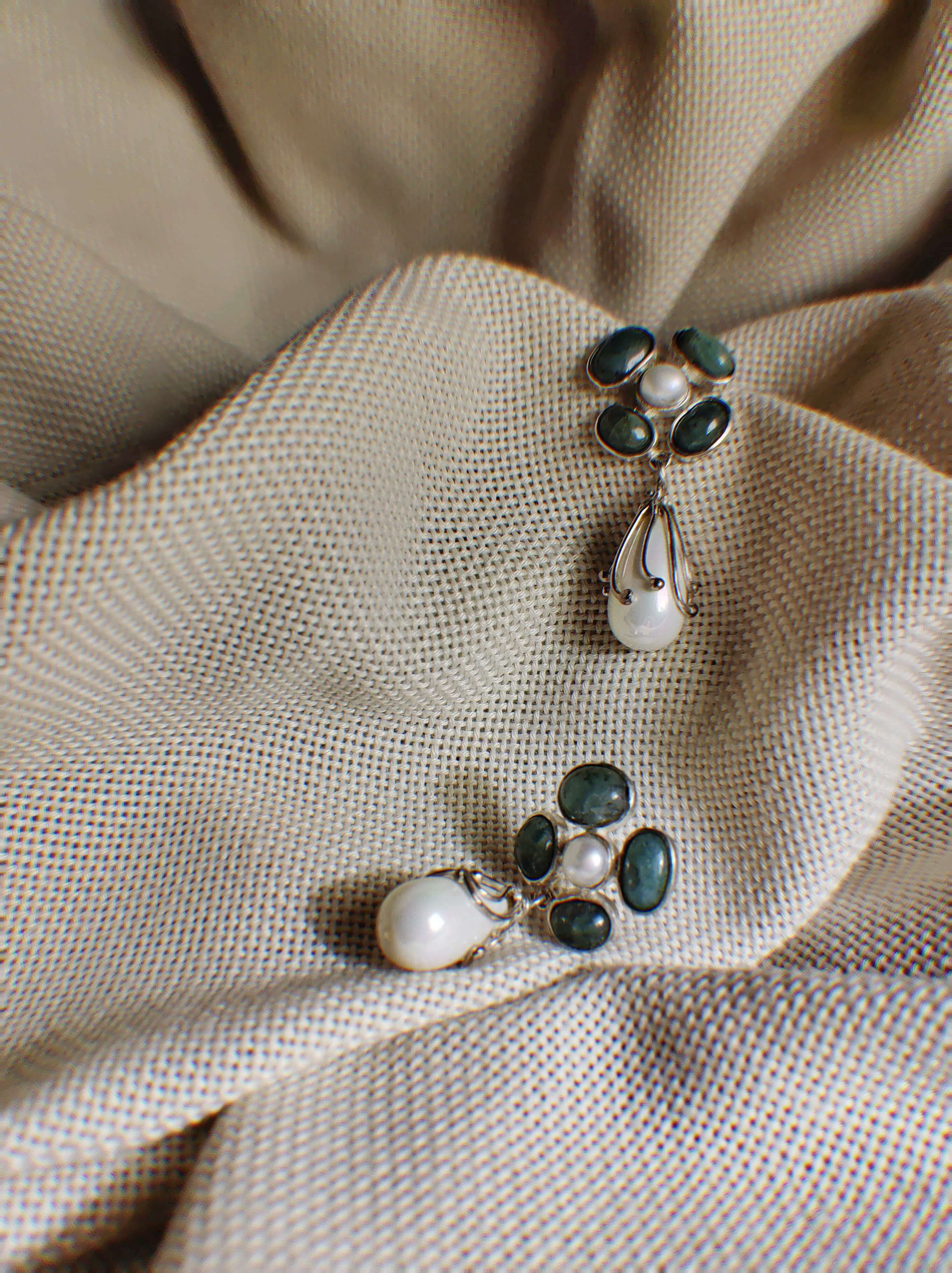 Tuberose: A handcrafted Earrings featuring nan and hues of nan.