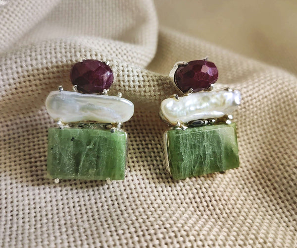 Cone flower: A handcrafted Earrings featuring nan and hues of nan.