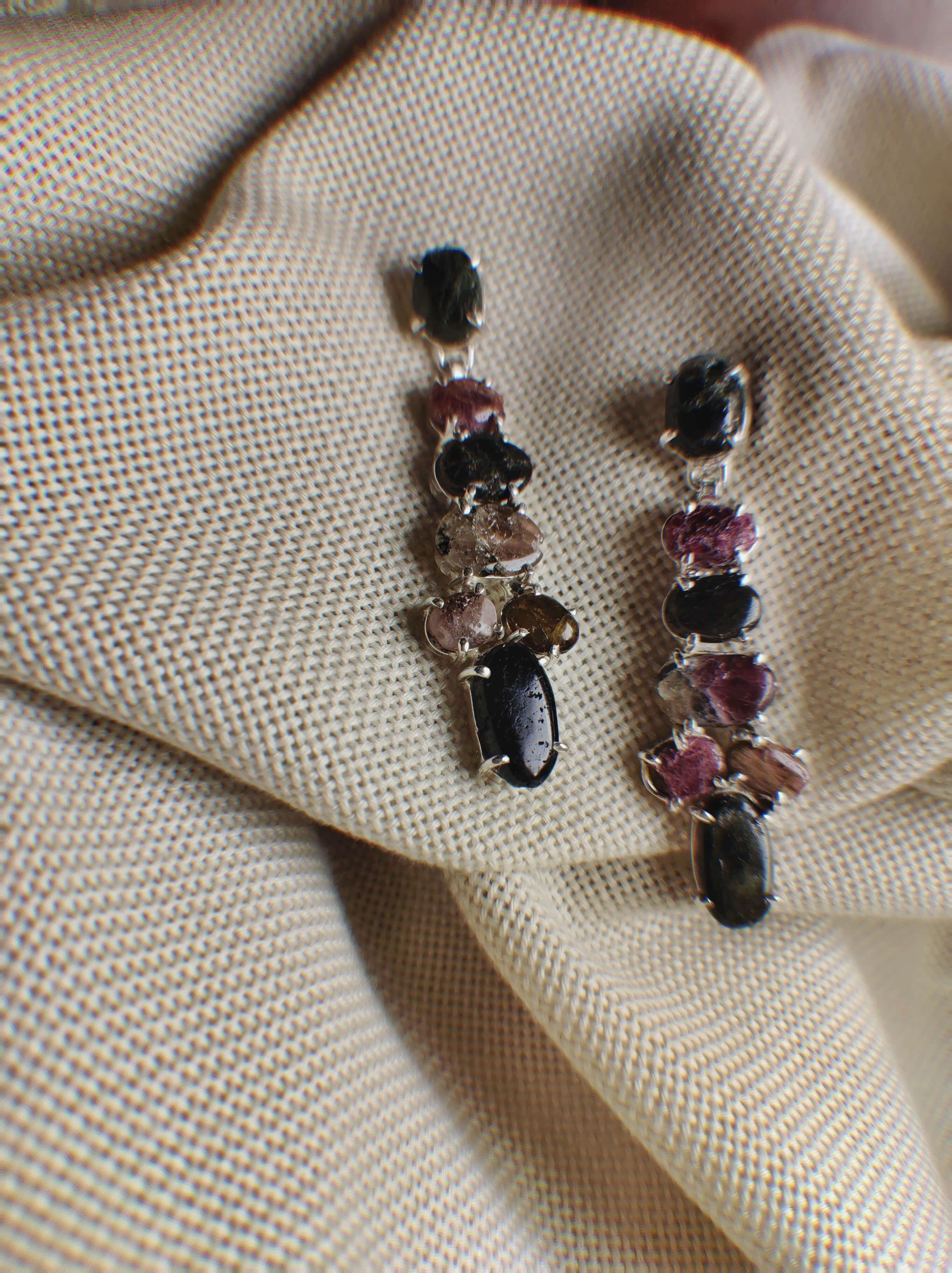 Lenten Rose: A handcrafted Earrings featuring nan and hues of nan.