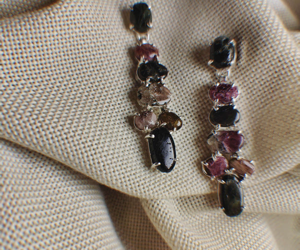Lenten Rose: A handcrafted Earrings featuring nan and hues of nan.
