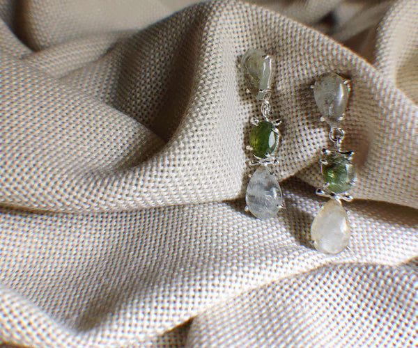 Hoya: A handcrafted Earrings featuring nan and hues of nan.