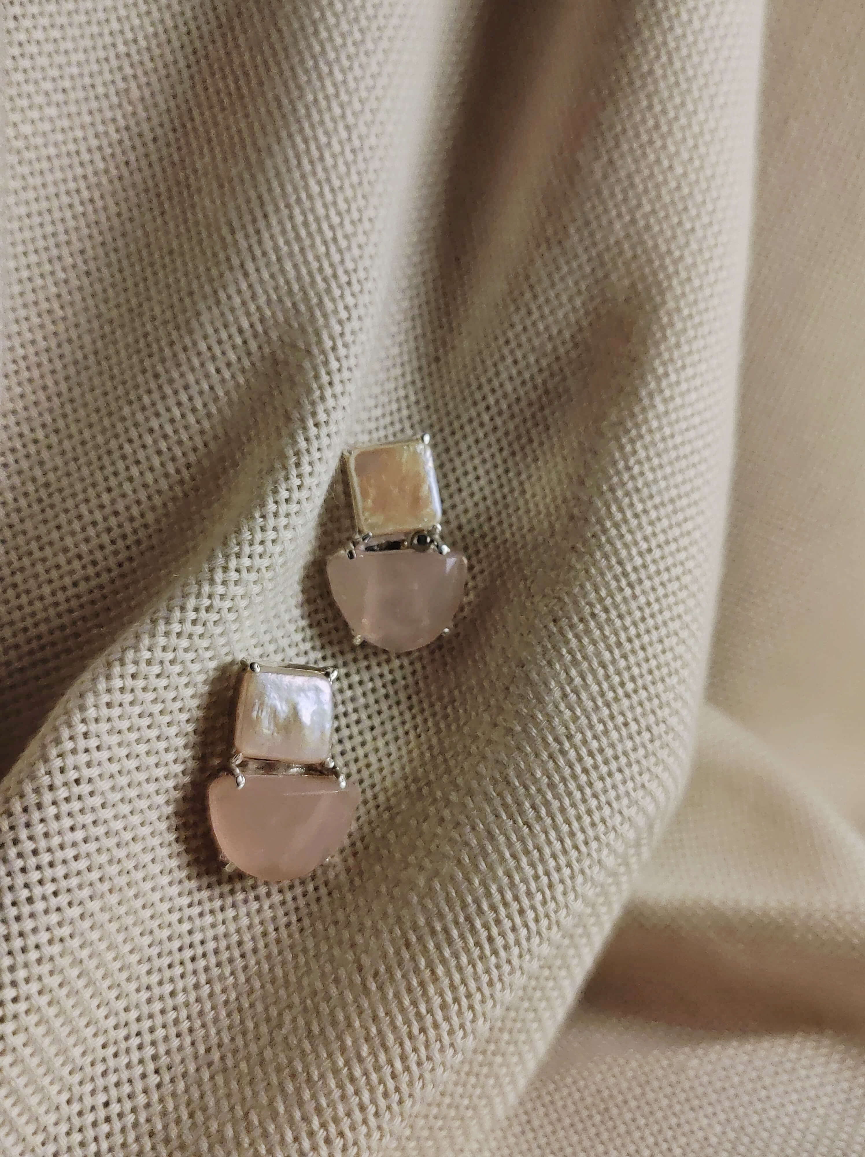 Gaura: A handcrafted Earrings featuring Peridot Quartz and hues of White Pink.