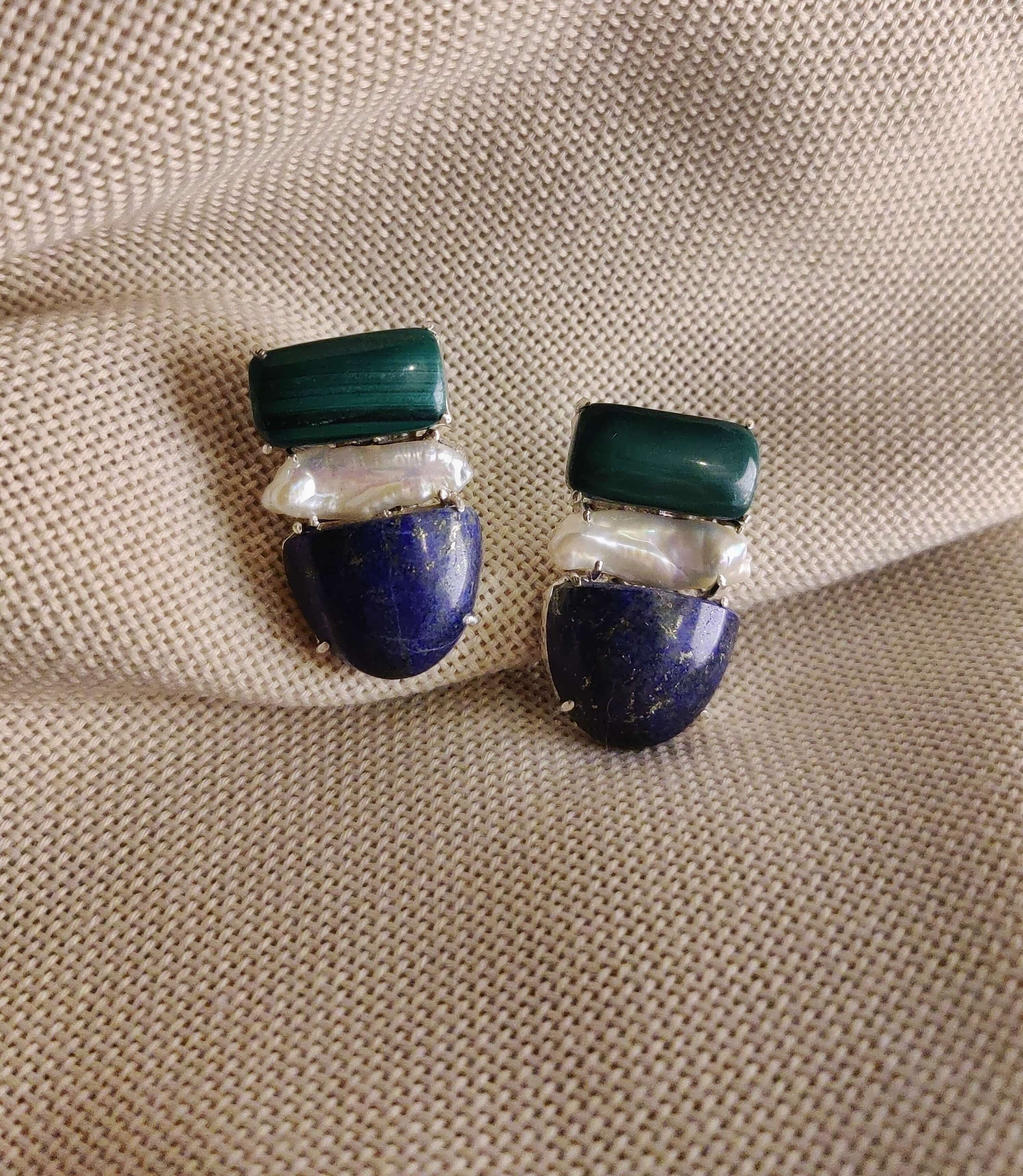 Lotus: A handcrafted Earrings featuring nan and hues of nan.
