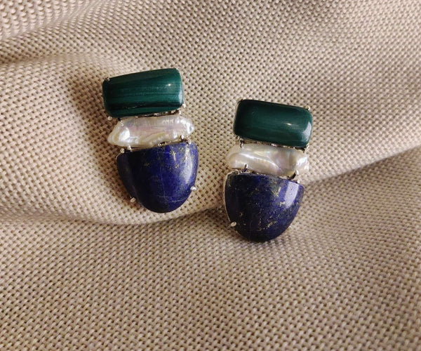 Lotus: A handcrafted Earrings featuring nan and hues of nan.